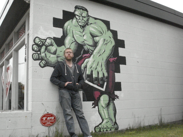 Life size Hulk on the side of a Comic store.